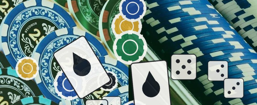 Pile of colorful casino chips with dice and a playing card hinting at gambling action on a table.