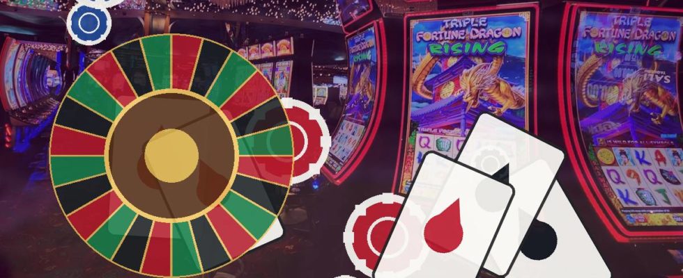 Roulette wheel with playing cards and poker chips in a casino arcade.